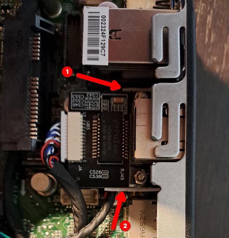 Photo showing installation of the M.2 Ethernet adapter in Lenovo M700.