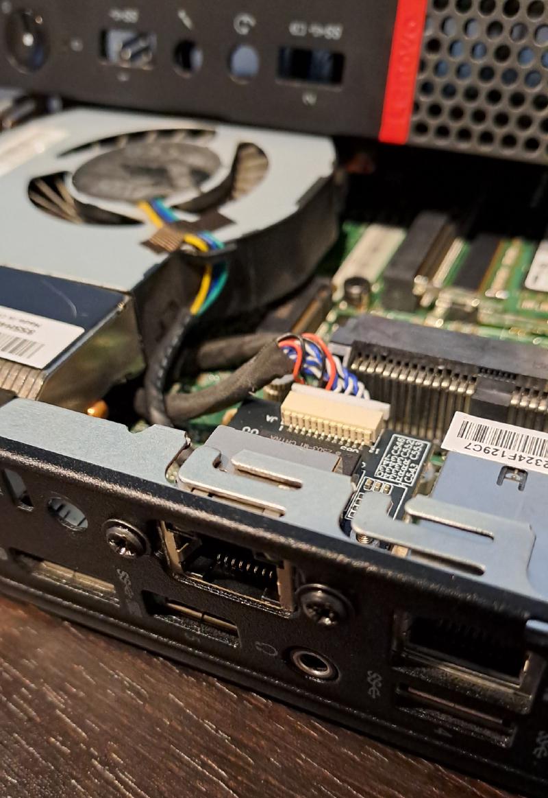 Photo showing installation of the M.2 Ethernet adapter in Lenovo M700.