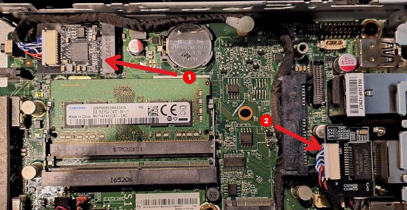 Photo showing installation of the M.2 Ethernet adapter in Lenovo M700.